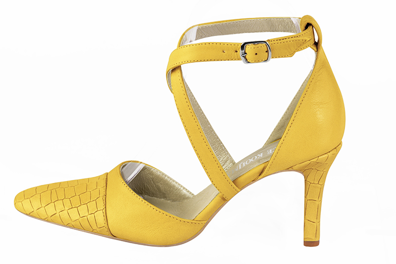 Yellow women's open side shoes, with crossed straps. Tapered toe. High slim heel. Profile view - Florence KOOIJMAN
